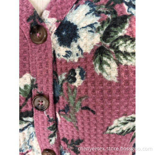 Blommig rund hals stickad cardigan